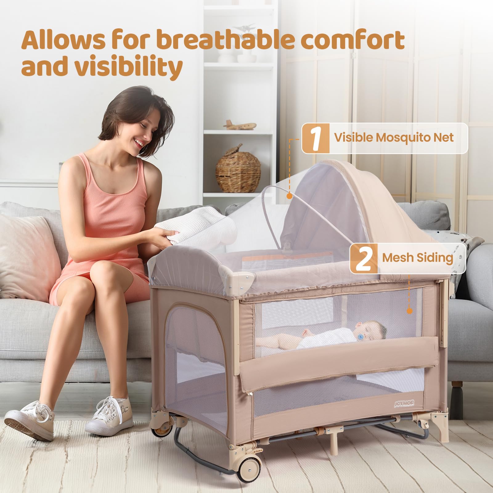 JOYMOR detachable mosquito net protecting baby during naps.