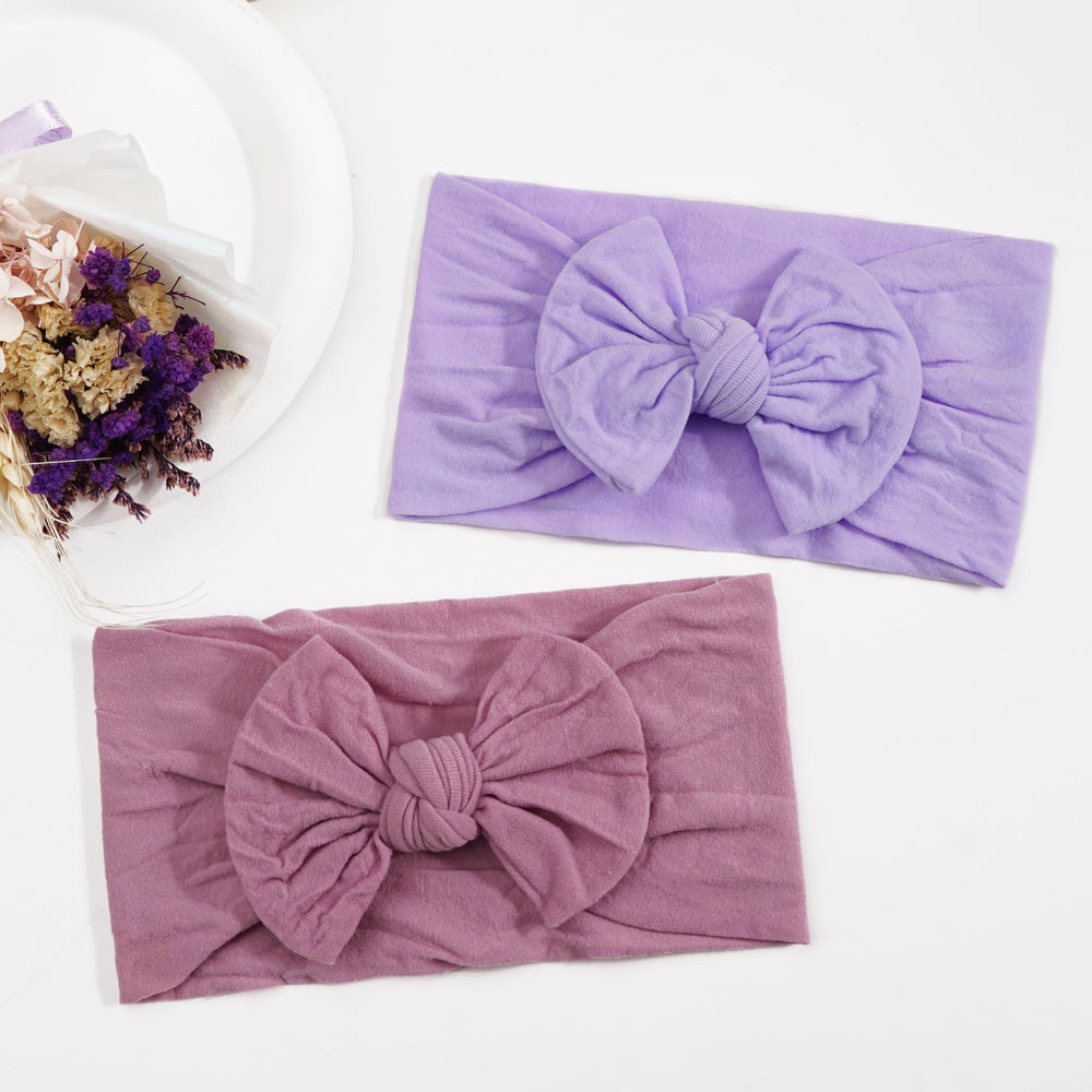 joyoyo baby headband bow detail showing soft nylon construction