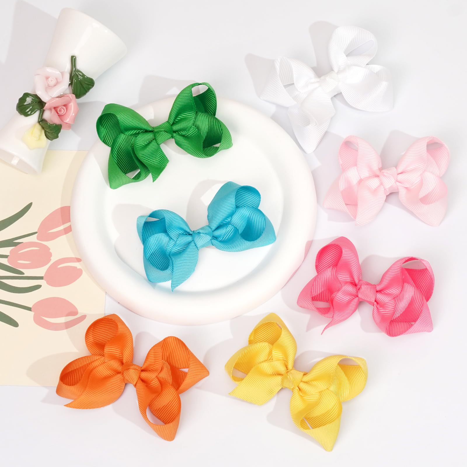 JOYOYO paired color bows ready for coordinating outfits and events.