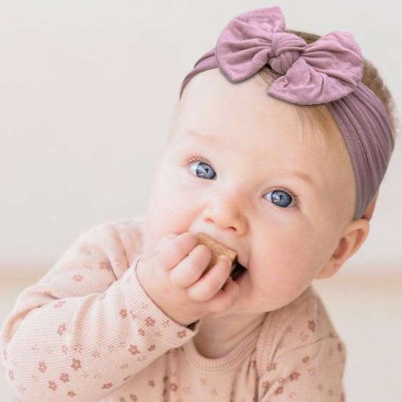 joyoyo headband on a baby during playtime keeps hair away