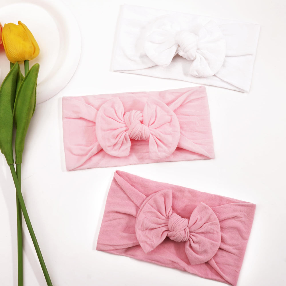 JOYOYO pink bow headbands close-up showing soft nylon material and secure fit