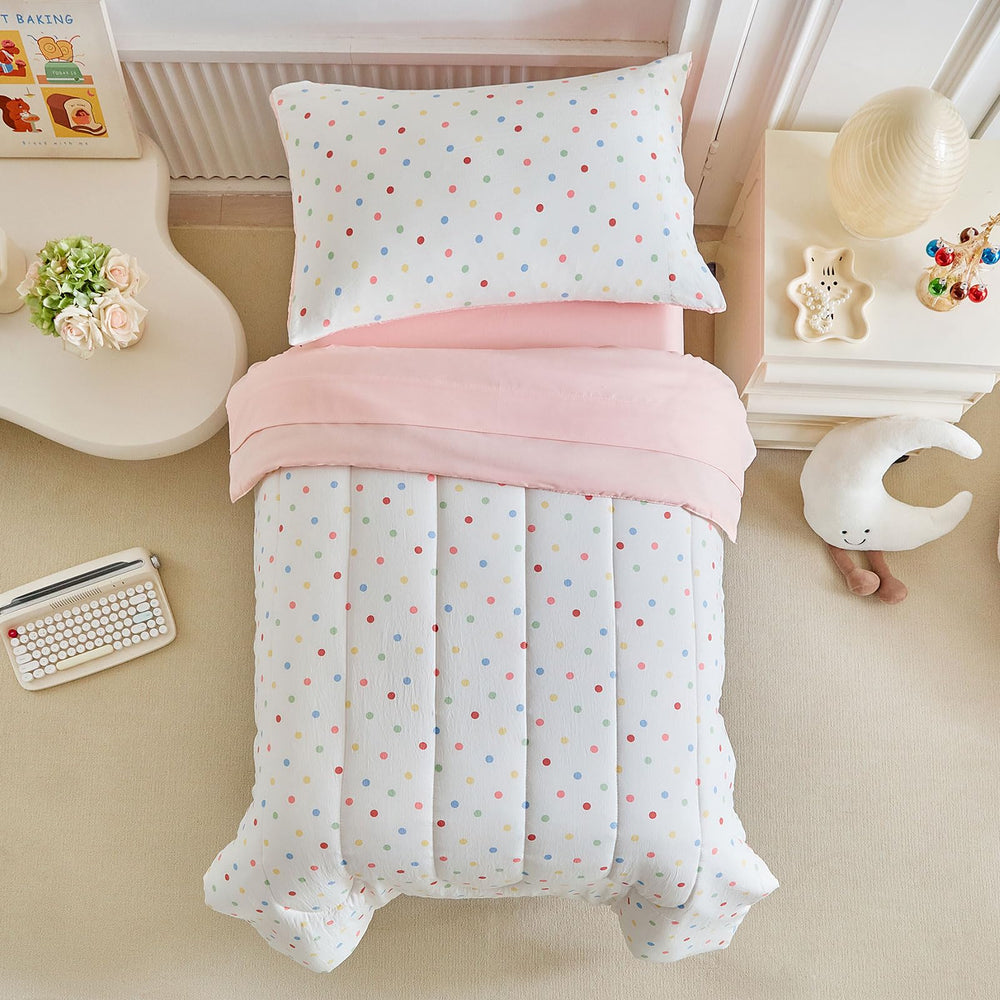 Joyreap polka dots pink-white reversible comforter provides cozy sleep for toddlers.