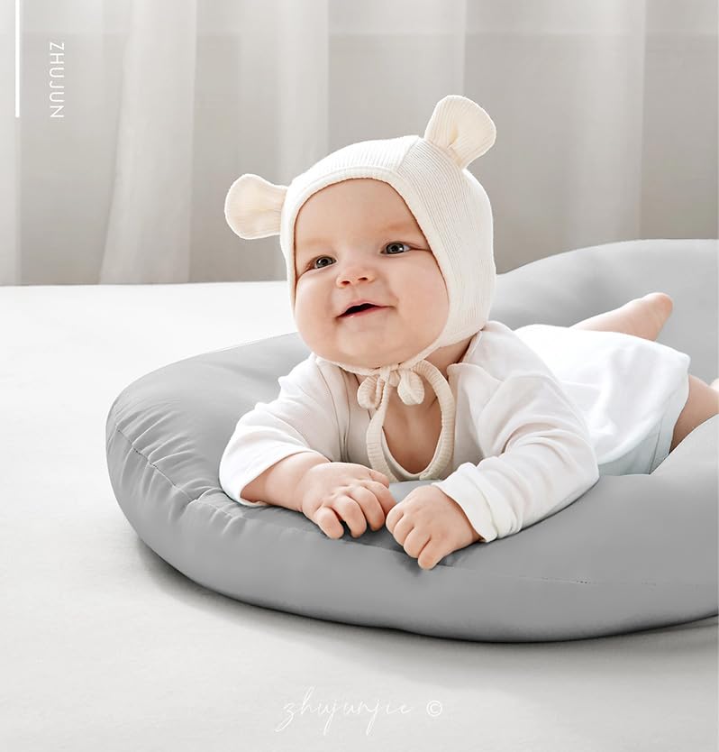 JQFORUIH lounger design promotes awake play and caregiver bonding
