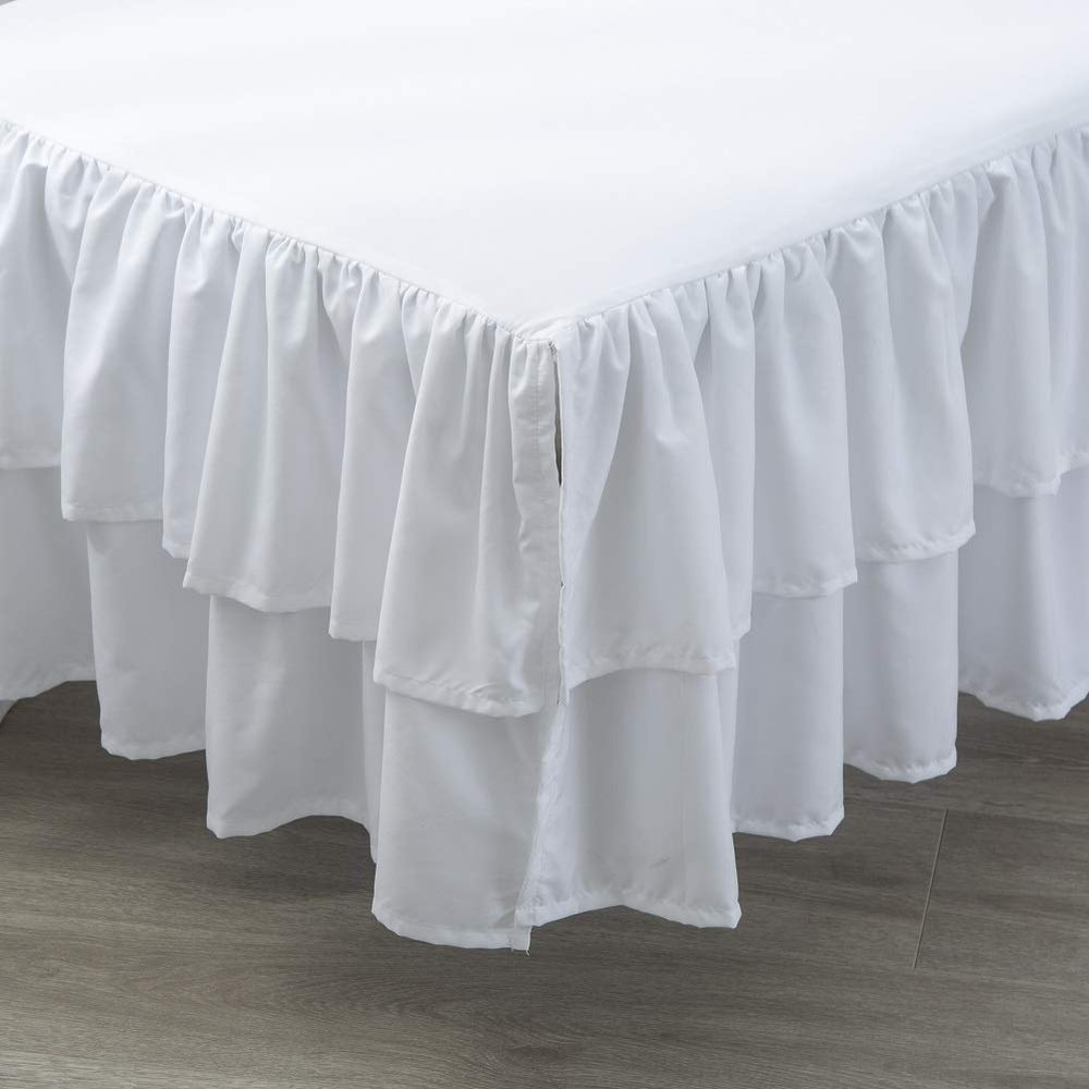 JSD machine-washable crib skirt simplifies cleanup after spills.