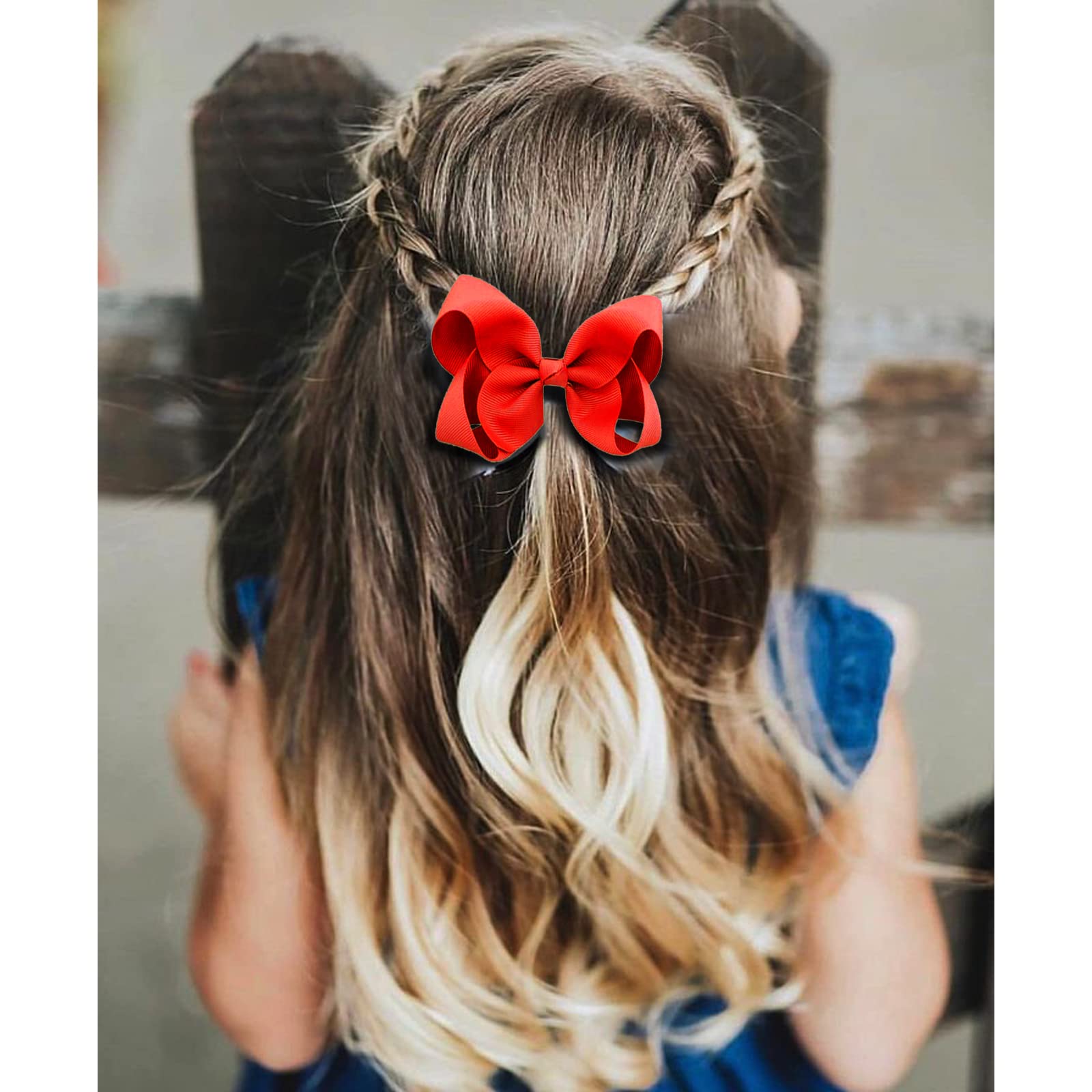 Close-up view of JUCCPUL red grosgrain ribbon shows handmade detail and color.