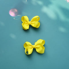 JUCCPUL grosgrain yellow bow close-up for coordinating outfits