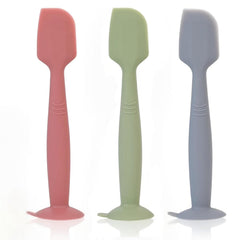Juhg baby diaper cream spatula with soft silicone head for mess-free application.
