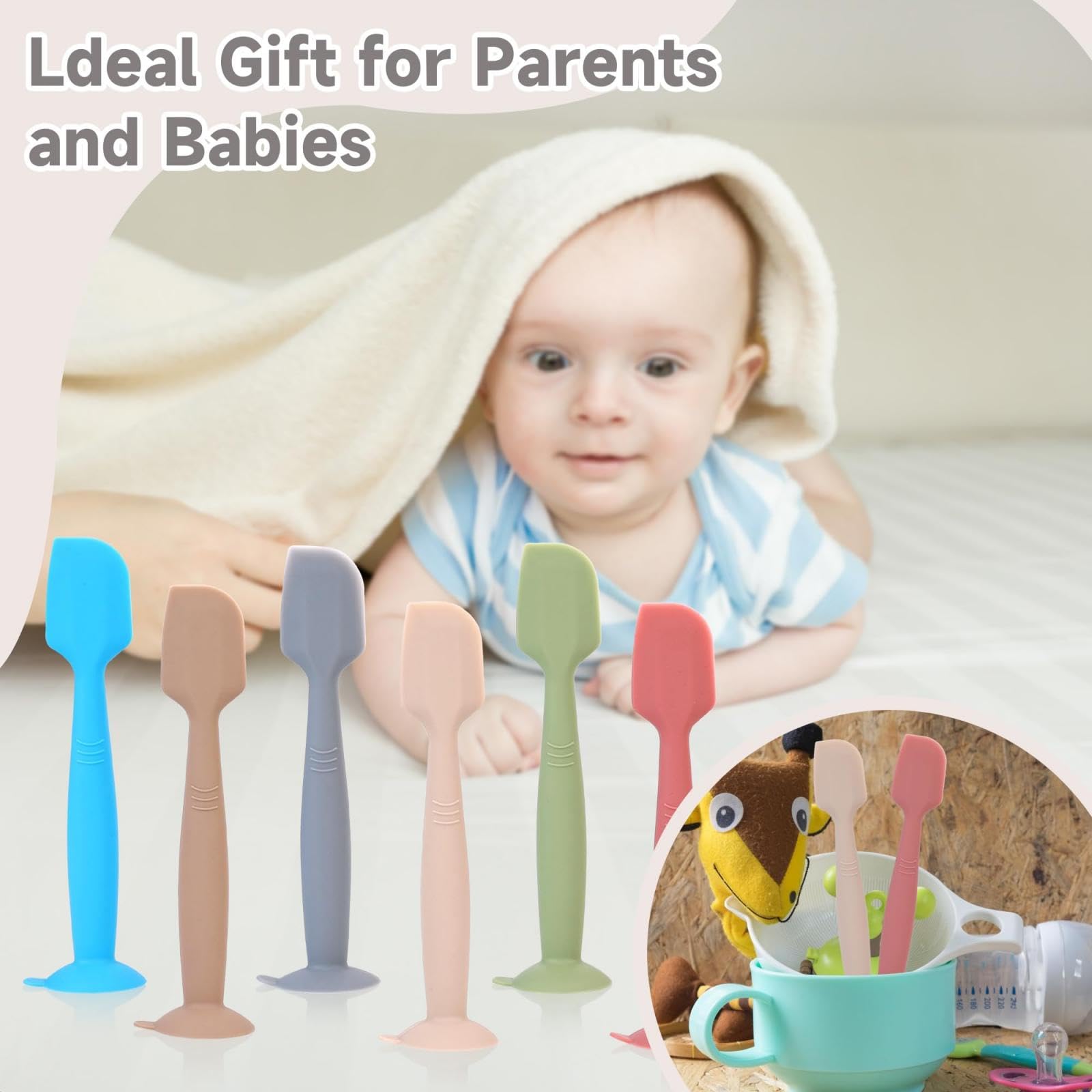Juhg diaper spatula with suction cup base keeps within reach during changes.