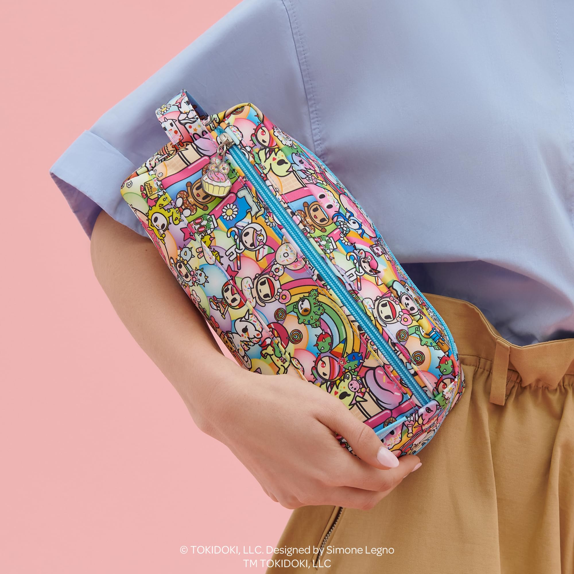 JuJuBe Be Dapper bag compact size fits luggage and backpacks.