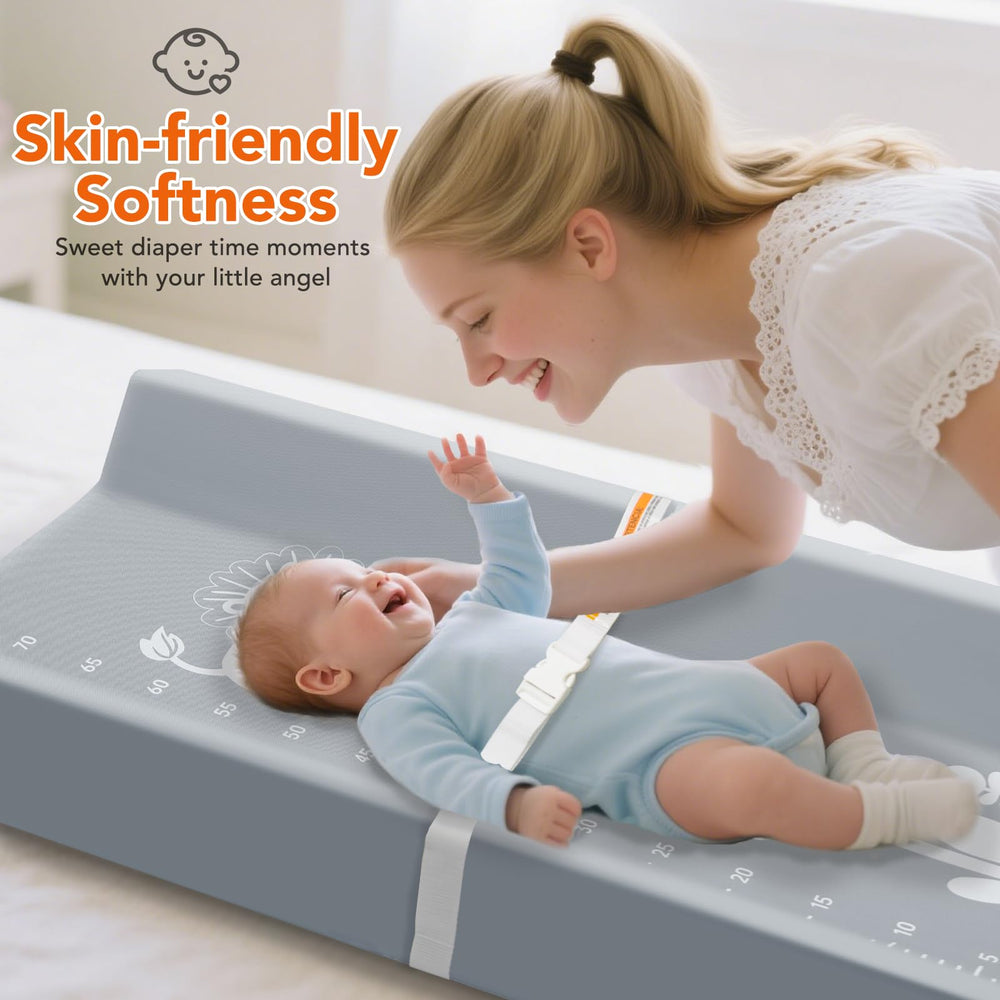 Juman growth ruler built-in helps capture milestones during diaper changes