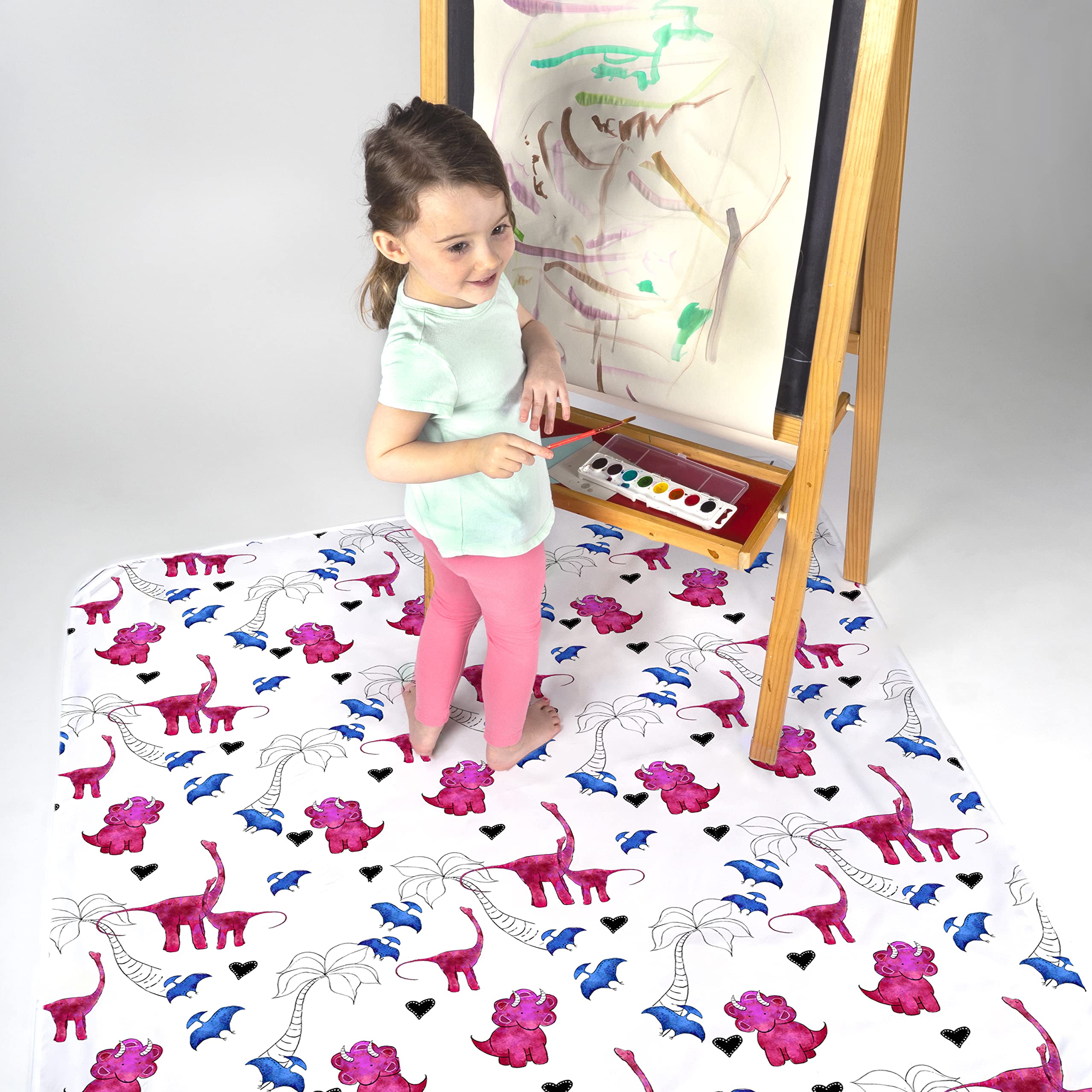 JumpOff Jo pink dinosaur splat mat 51x51 coverage for meals and crafts.