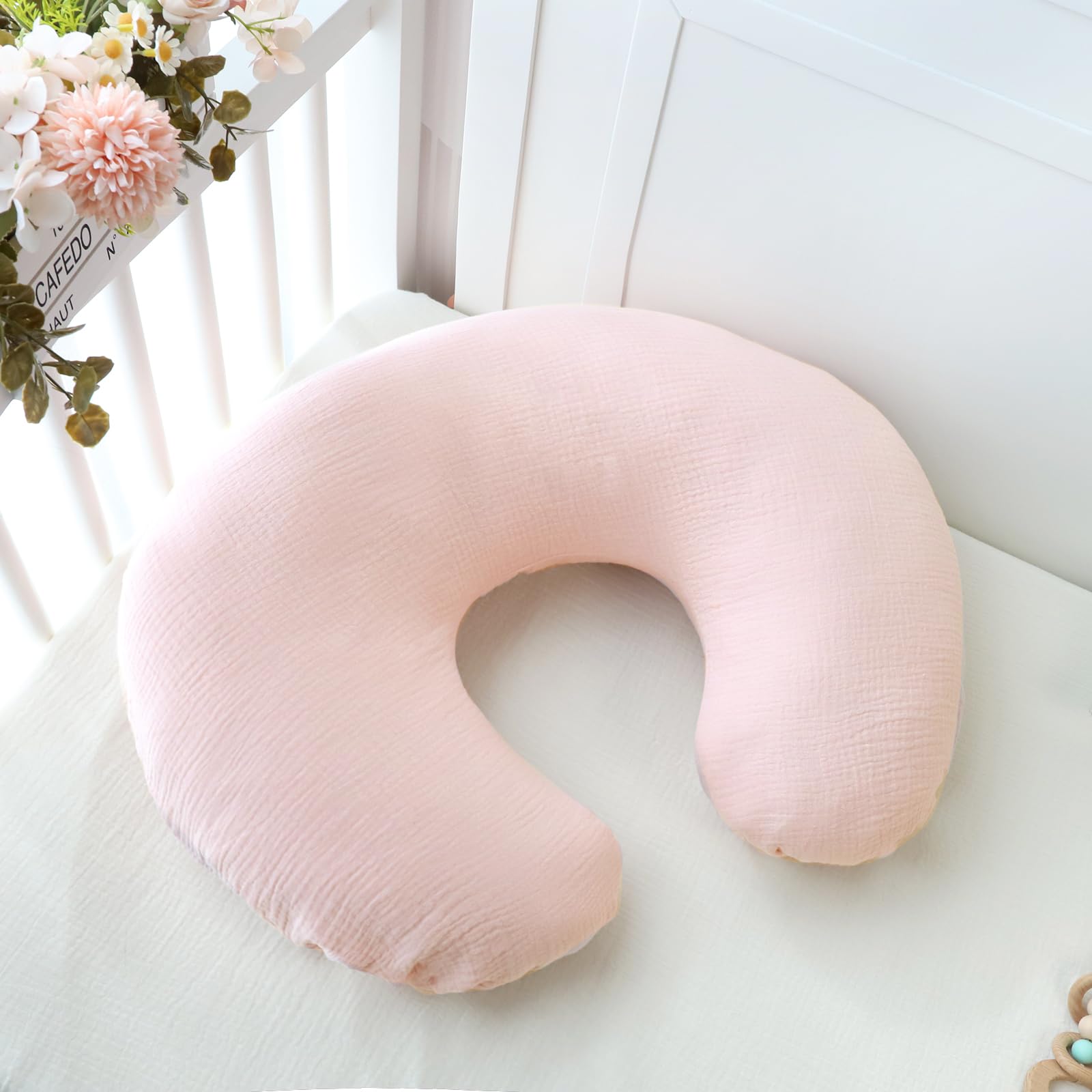 Jundetye baby nursing pillow cover pink fiber closeup illustrates premium muslin texture and softness