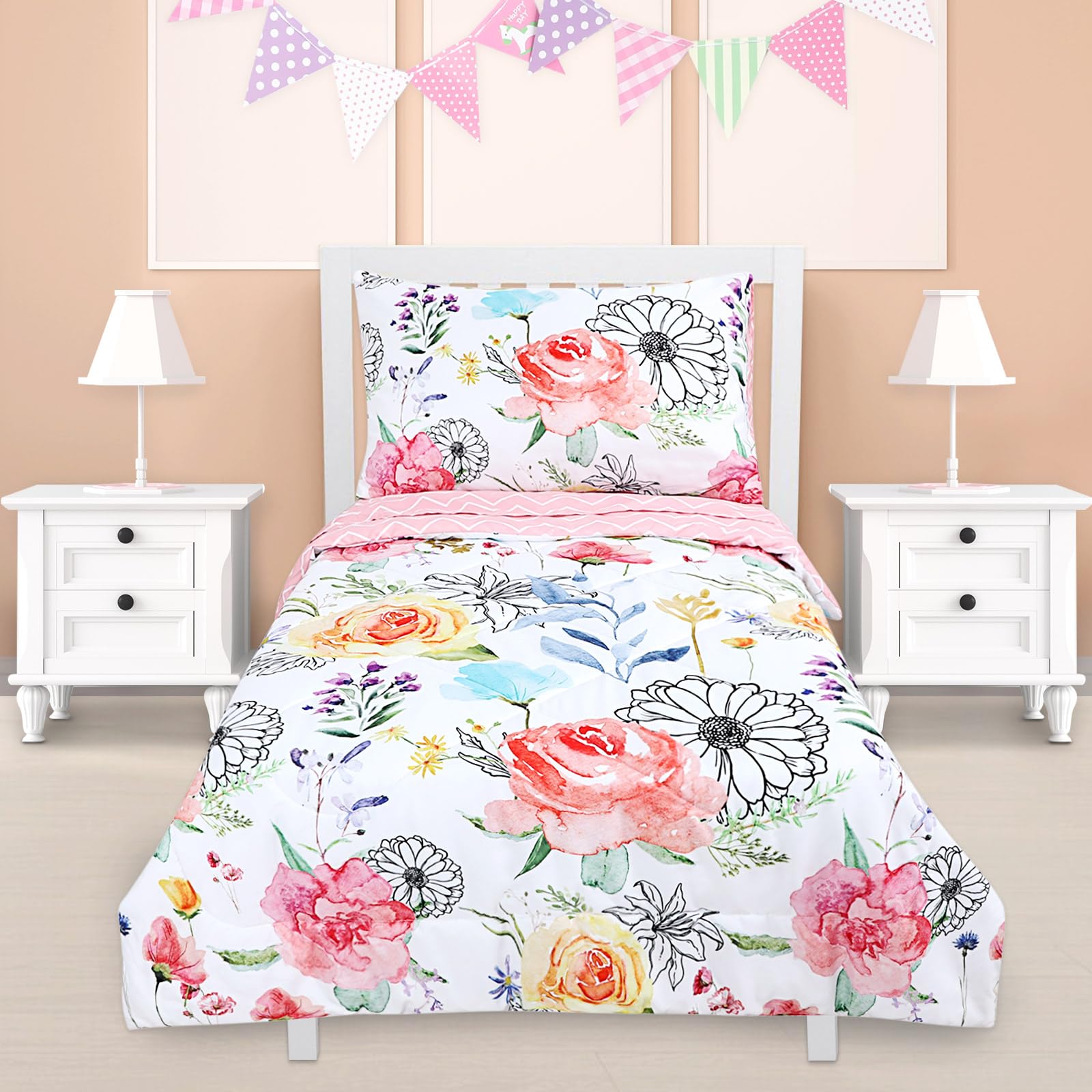 Jundetye floral bedding in a pink nursery complements whimsical decor.