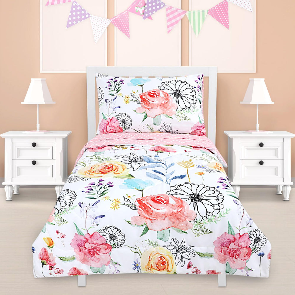 Jundetye floral bedding in a pink nursery complements whimsical decor.