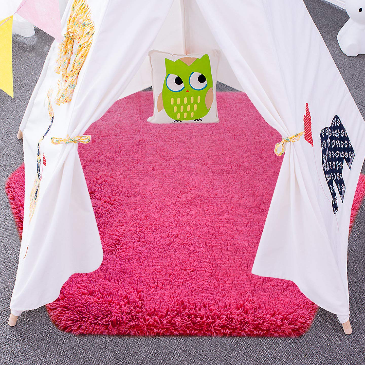 Junovo hot-pink kids play rug brightens nurseries and supports imaginative play.