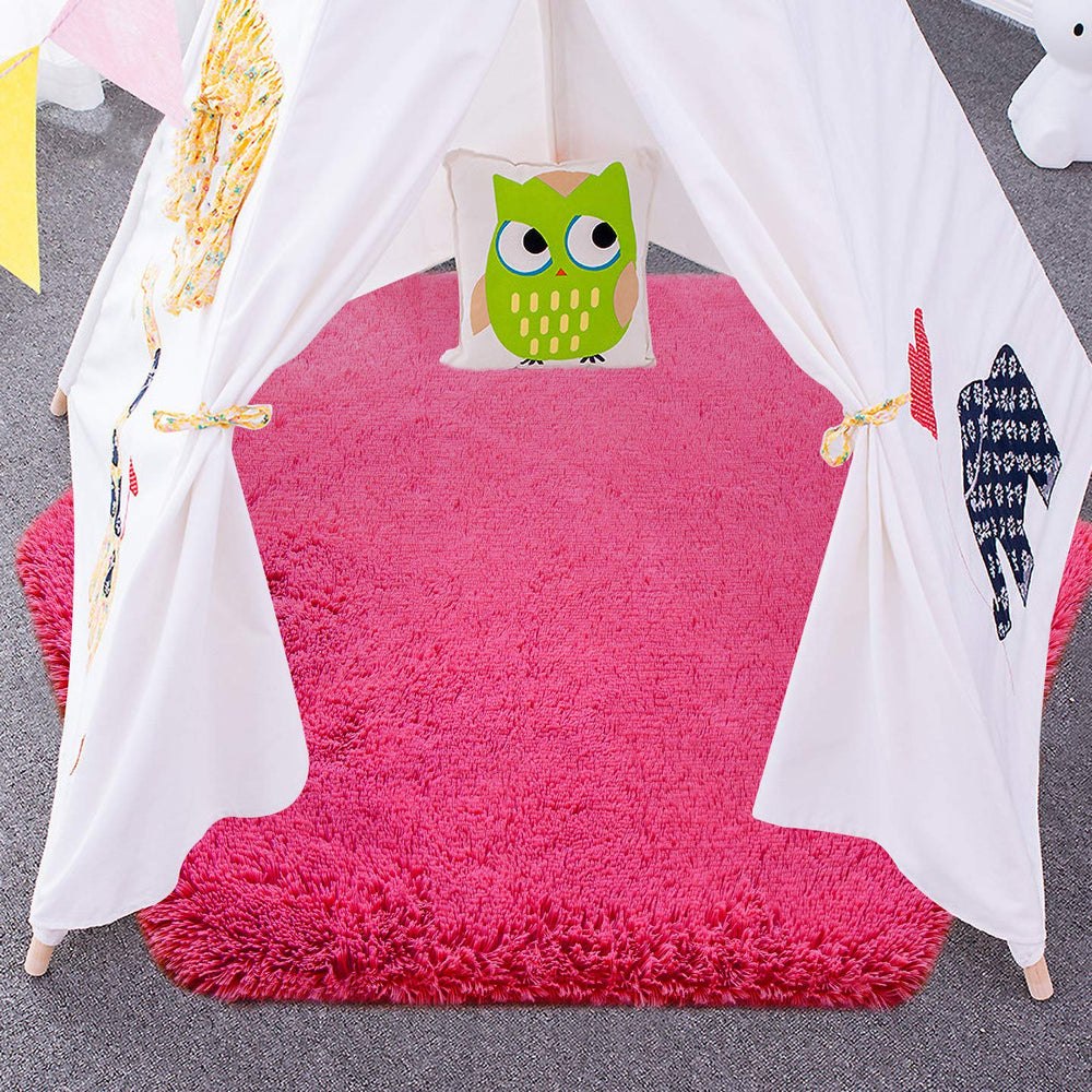 Junovo hot-pink kids play rug brightens nurseries and supports imaginative play.