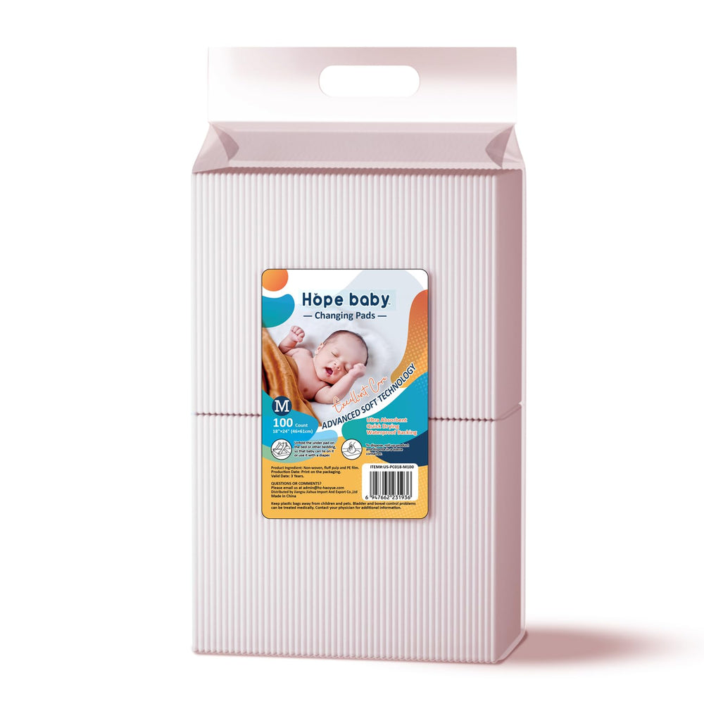 JUS COOl baby disposable changing pad 18x24 packaged for portable, leak-free diaper changes.