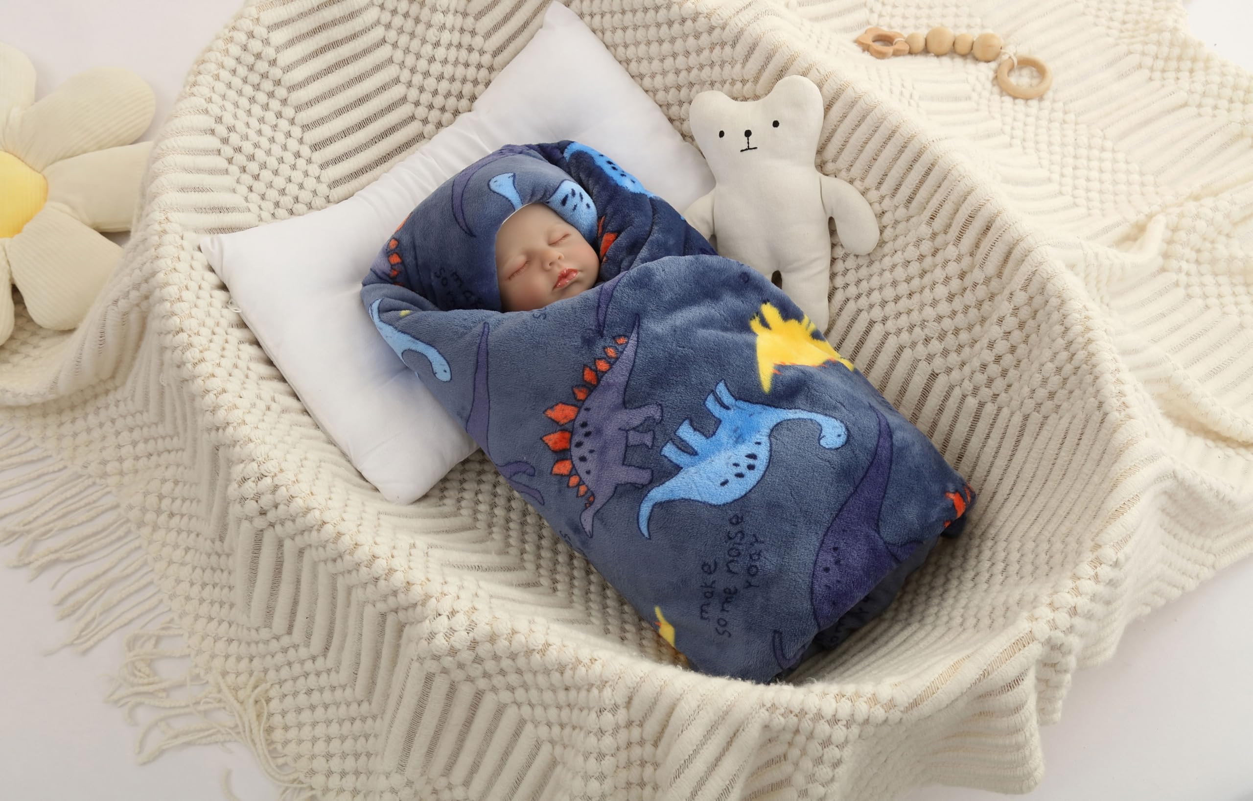 JZLPIN flannel reversible baby blanket in blue dinosaur pattern for cozy crib time.