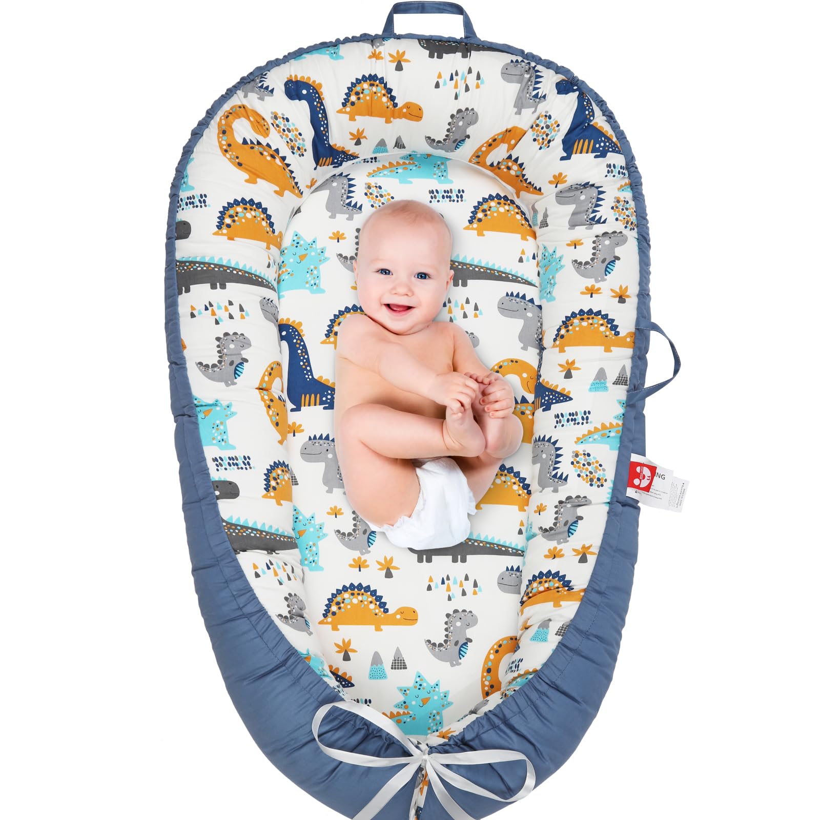 Kabirili baby lounger with reversible cover for quick style changes and comfort.