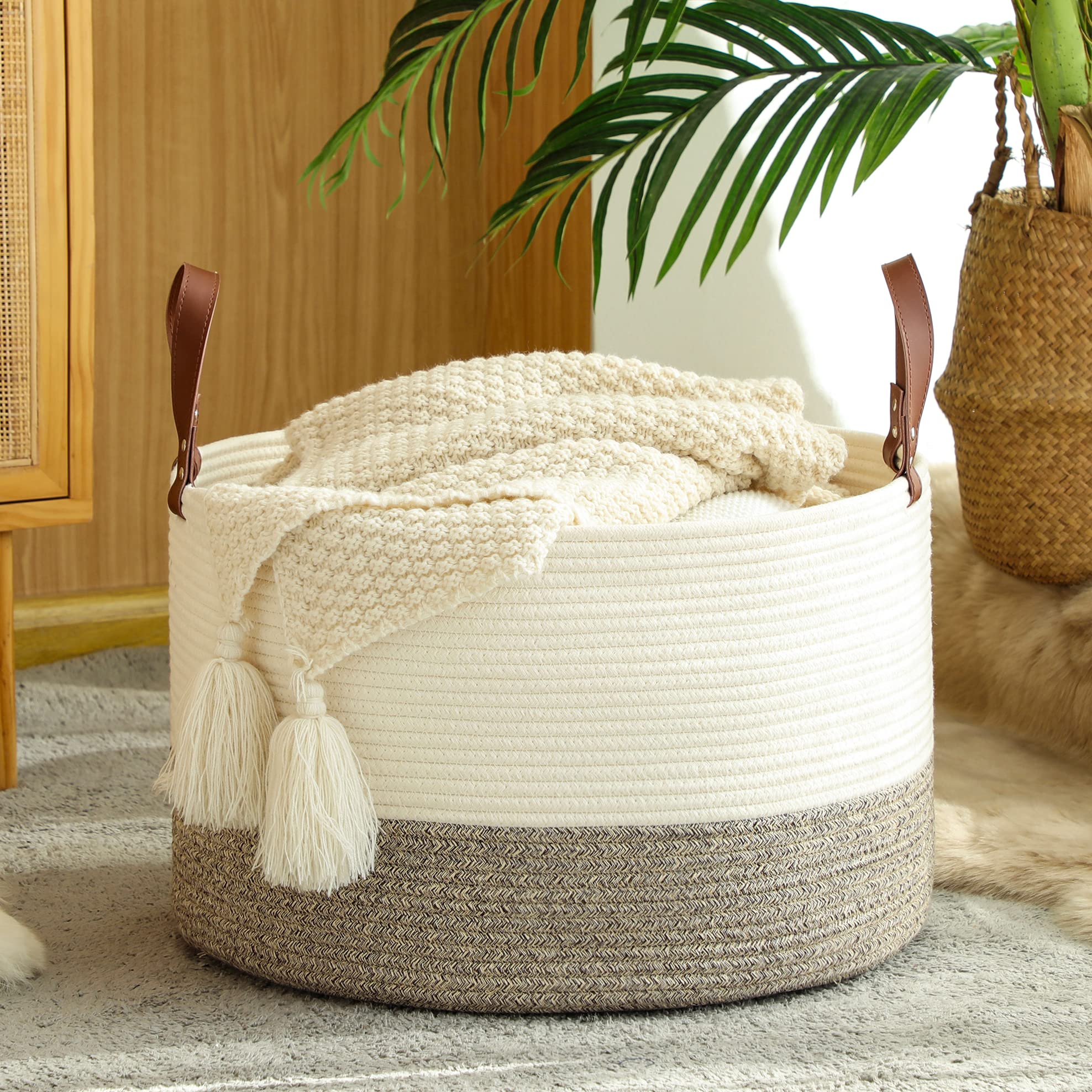 KAKAMAY blanket basket white-beige side view highlighting portable design for nursery.