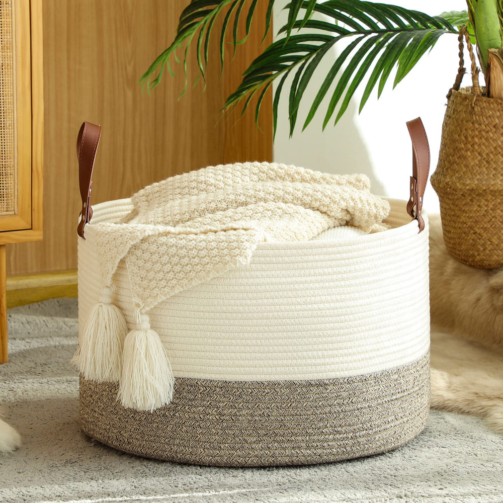 KAKAMAY blanket basket white-beige side view highlighting portable design for nursery.