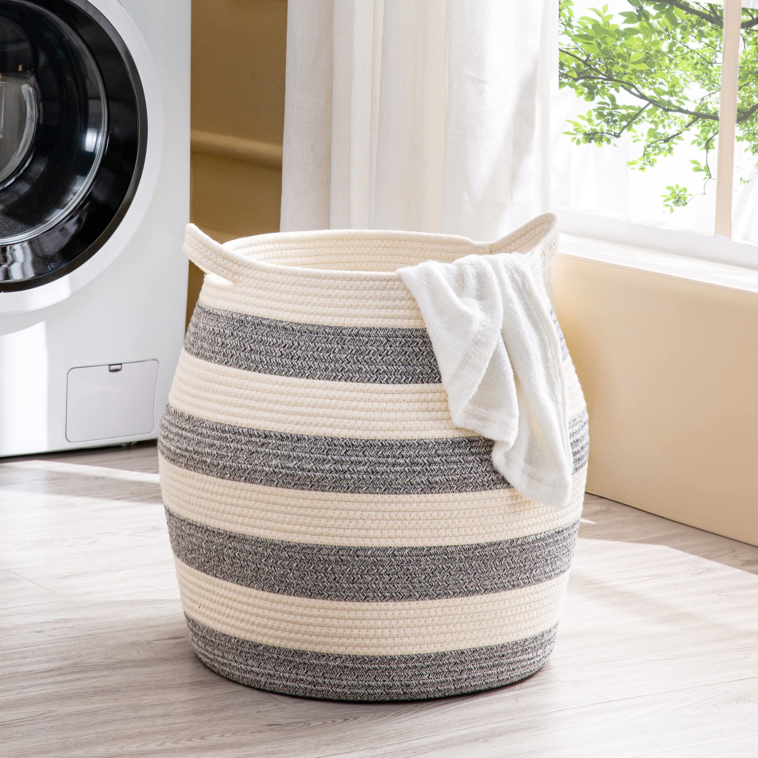 KAKAMAY collapsible storage basket in living room highlights space-saving design.