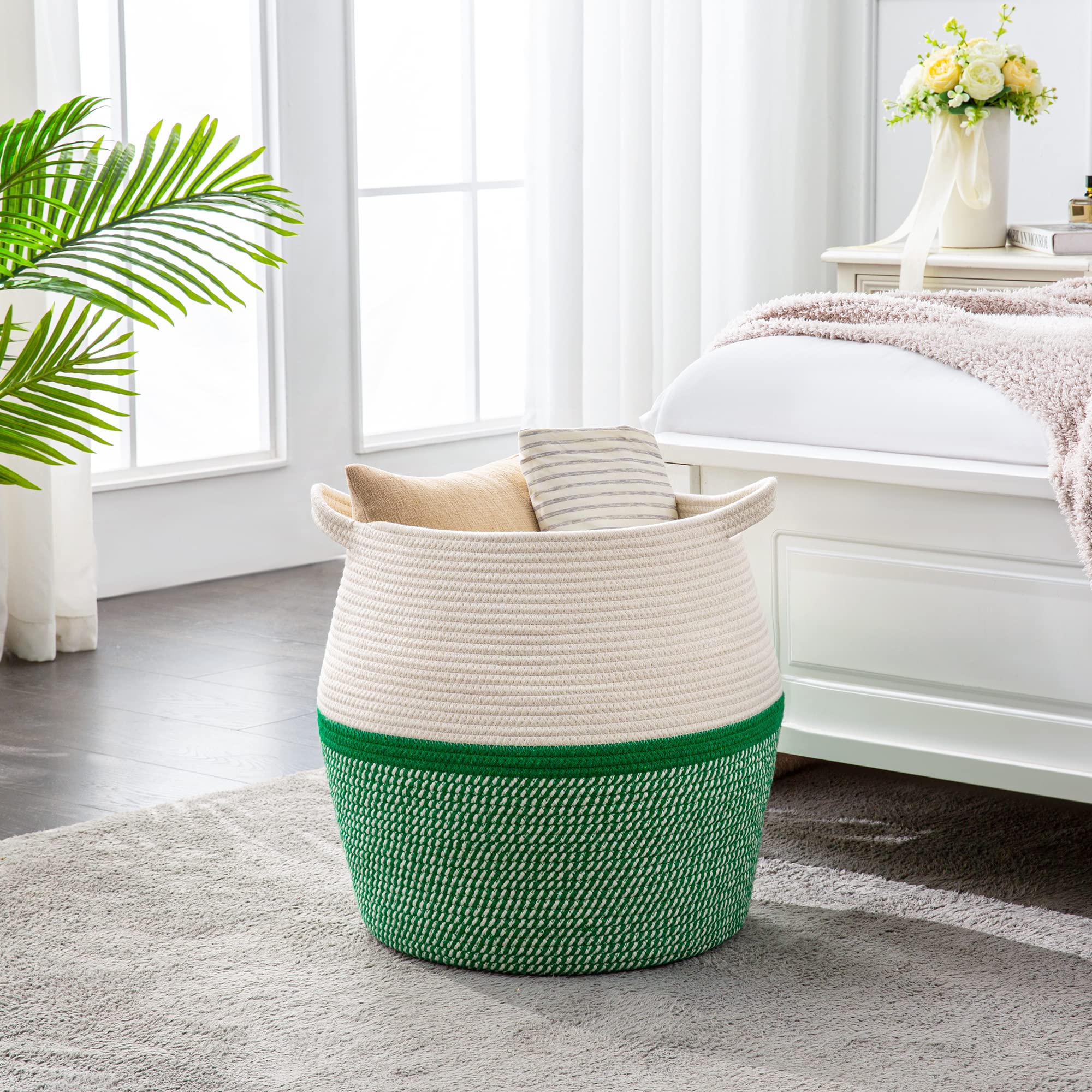 KAKAMAY living room setup with green basket for cozy blanket storage.