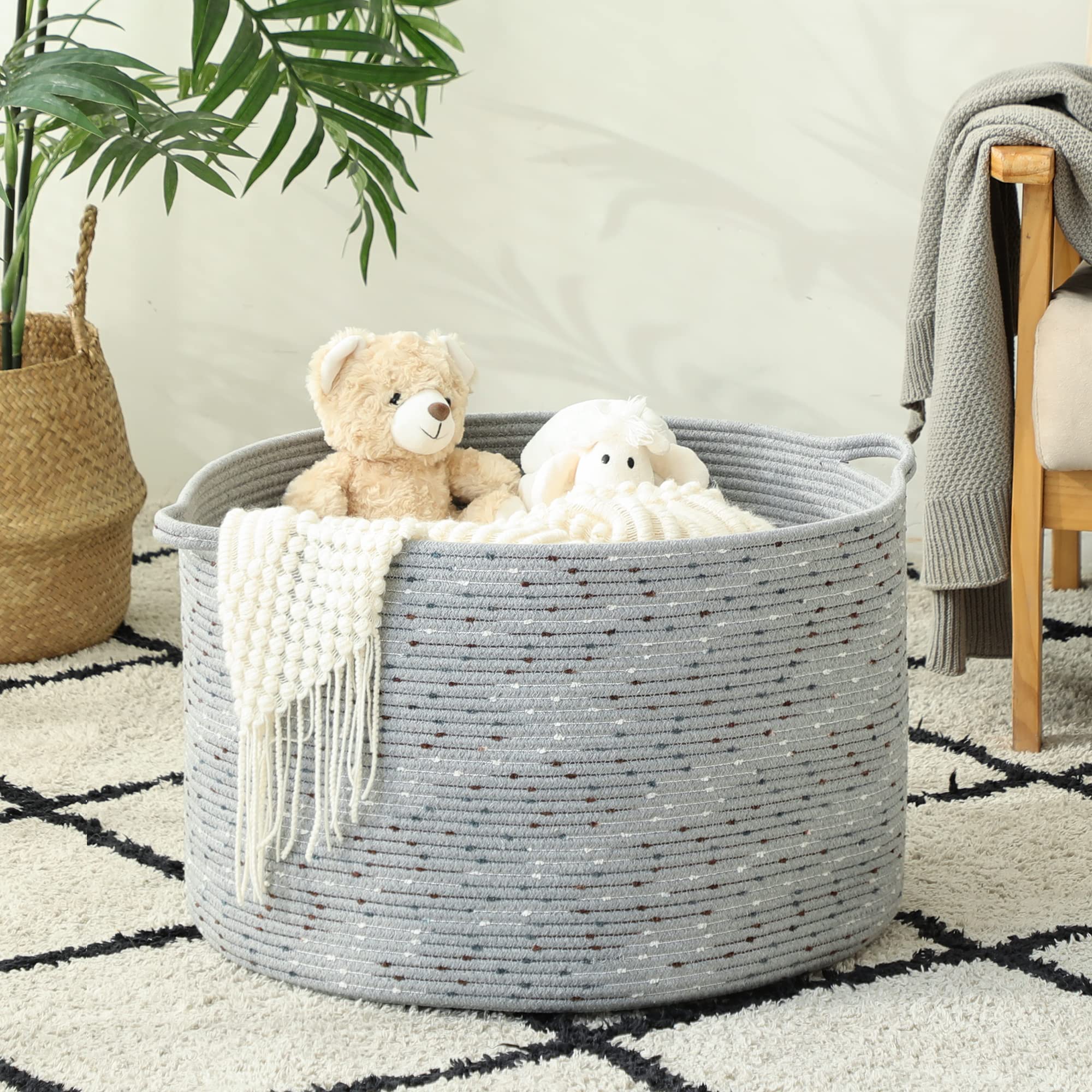 KAKAMAY grey dotted blanket basket for stylish storage.