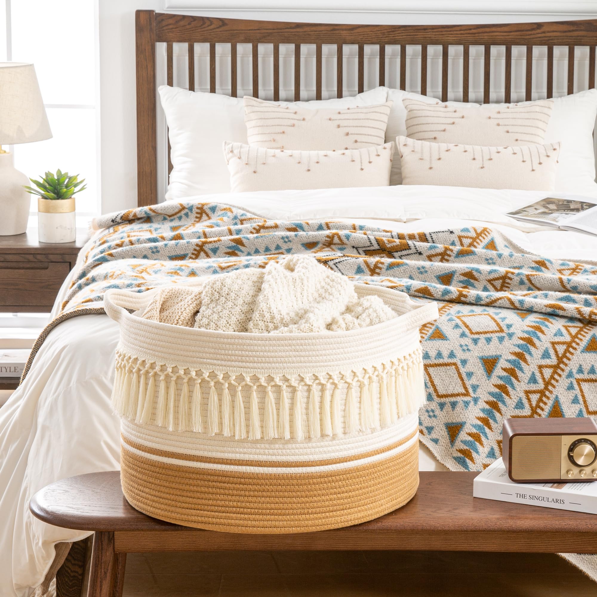 KAKAMAY large blanket basket in living room shows versatile laundry and blanket storage