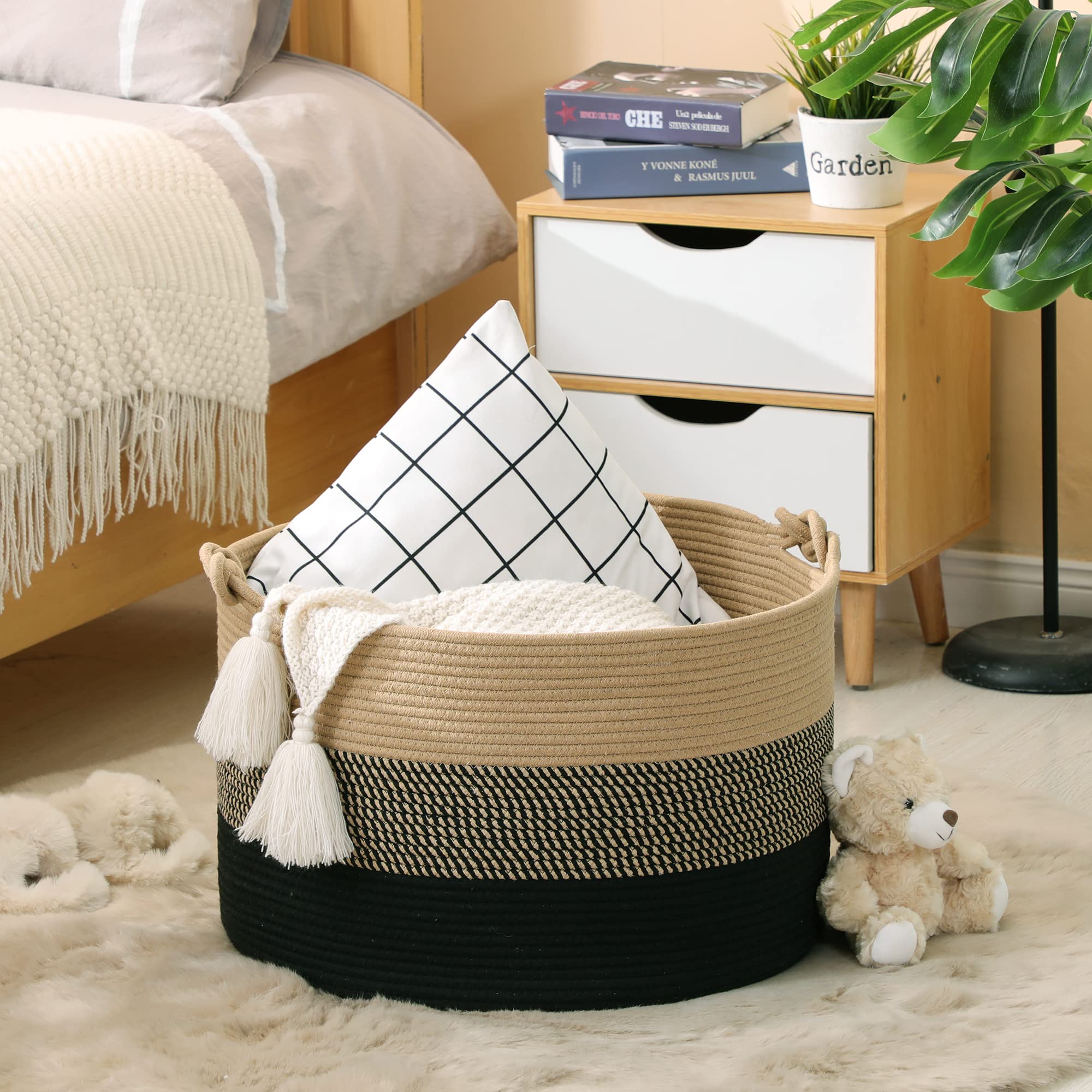 KAKAMAY laundry basket in use for towels and garments.