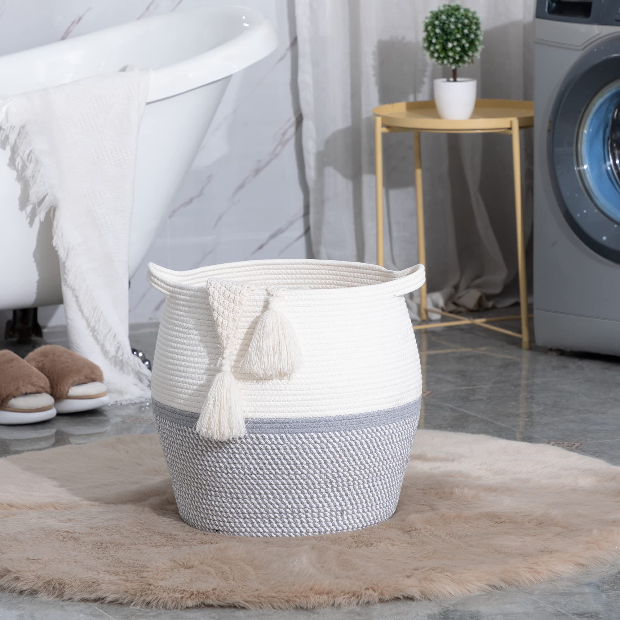 KAKAMAY multi-purpose grey basket used to organize diapers and smaller items.