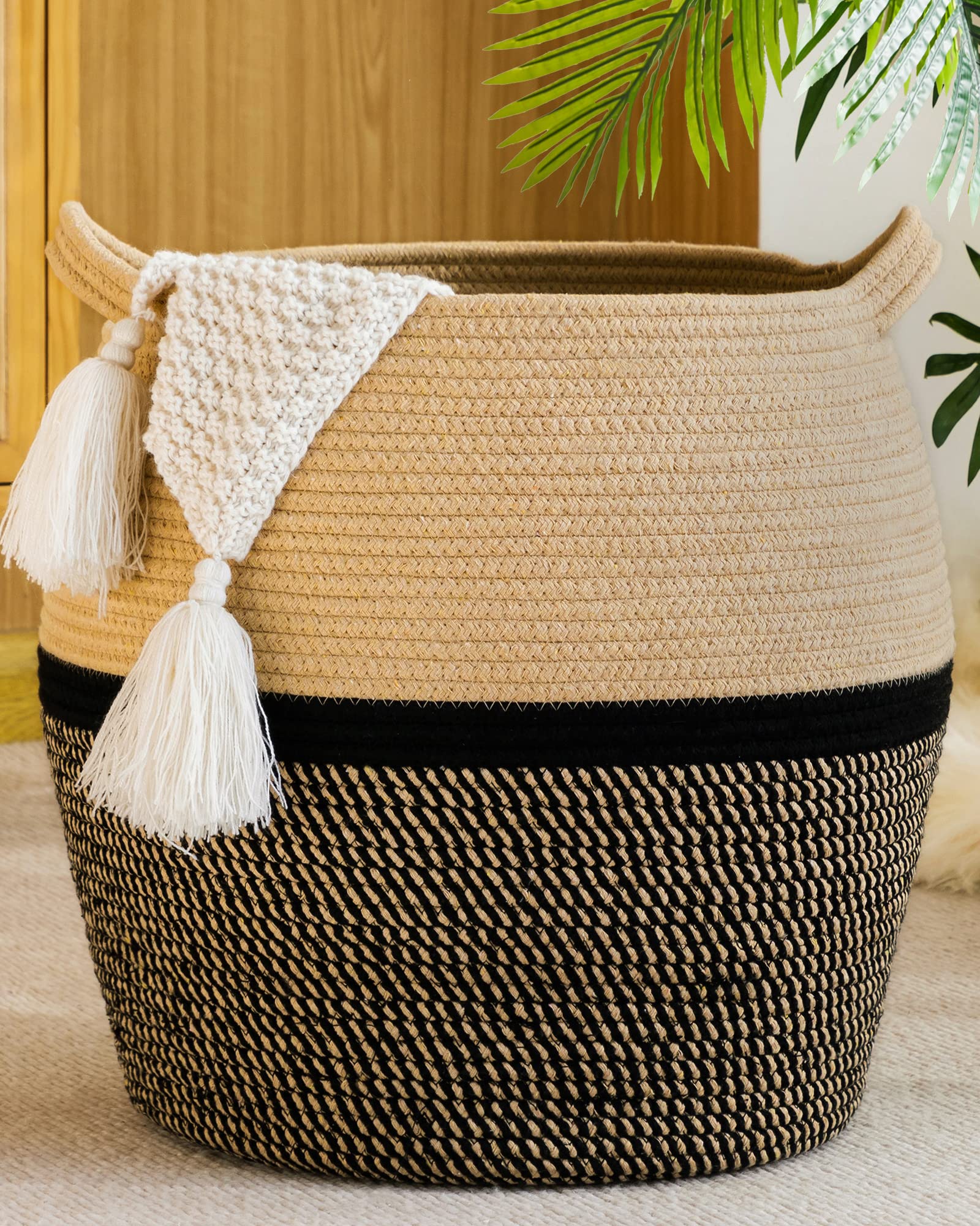 KAKAMAY woven basket stores blankets neatly for living room.