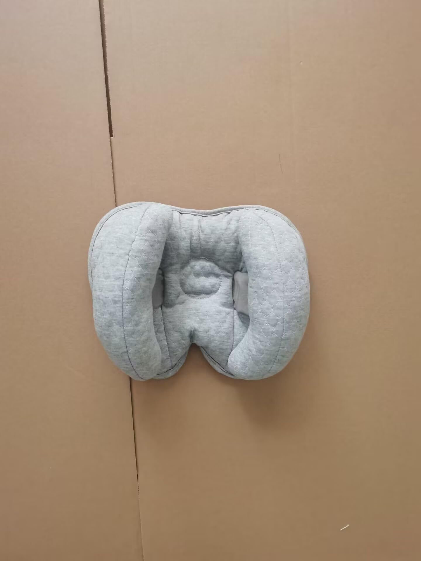KAKIBLIN soft breathable fabric interior gray pillow with baby head support.