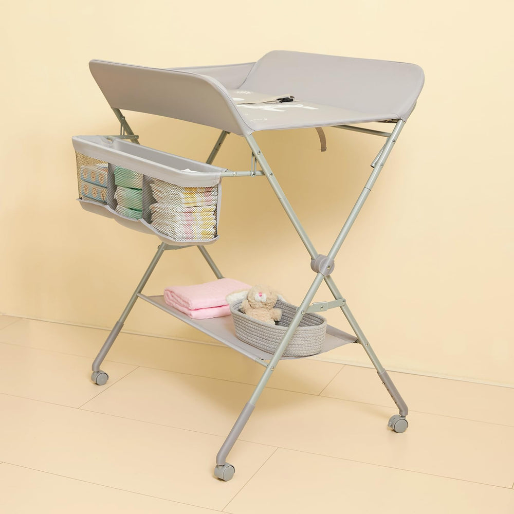 KARAOK baby changing table with wheels demonstrates portable, adjustable-height design.