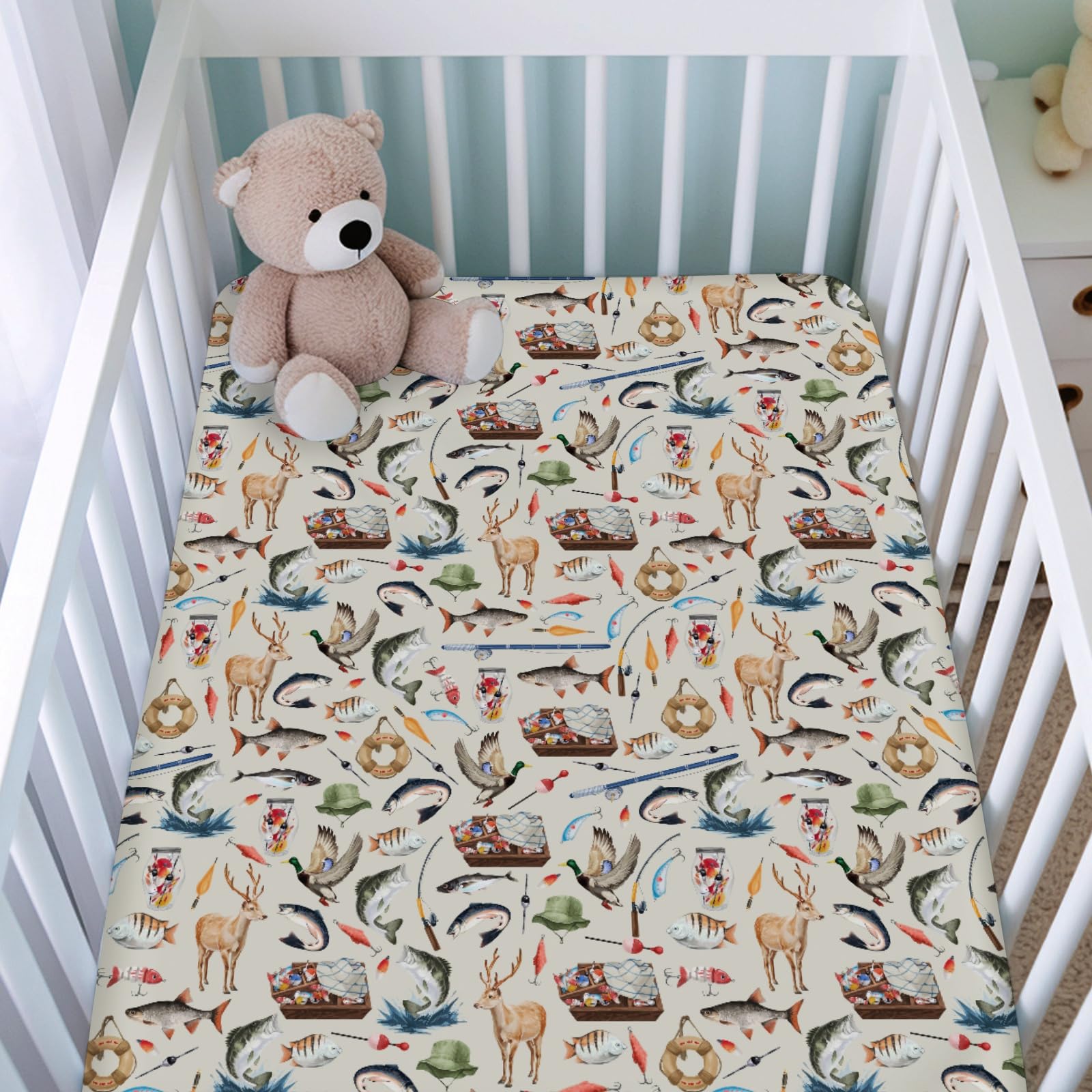 KASTLEE green animal-print crib sheet adds cozy softness to baby’s nursery