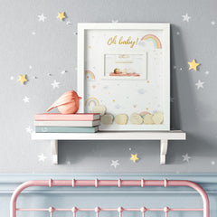 Kate Aspen Boho Rainbow guestbook displayed on easel for nursery decor