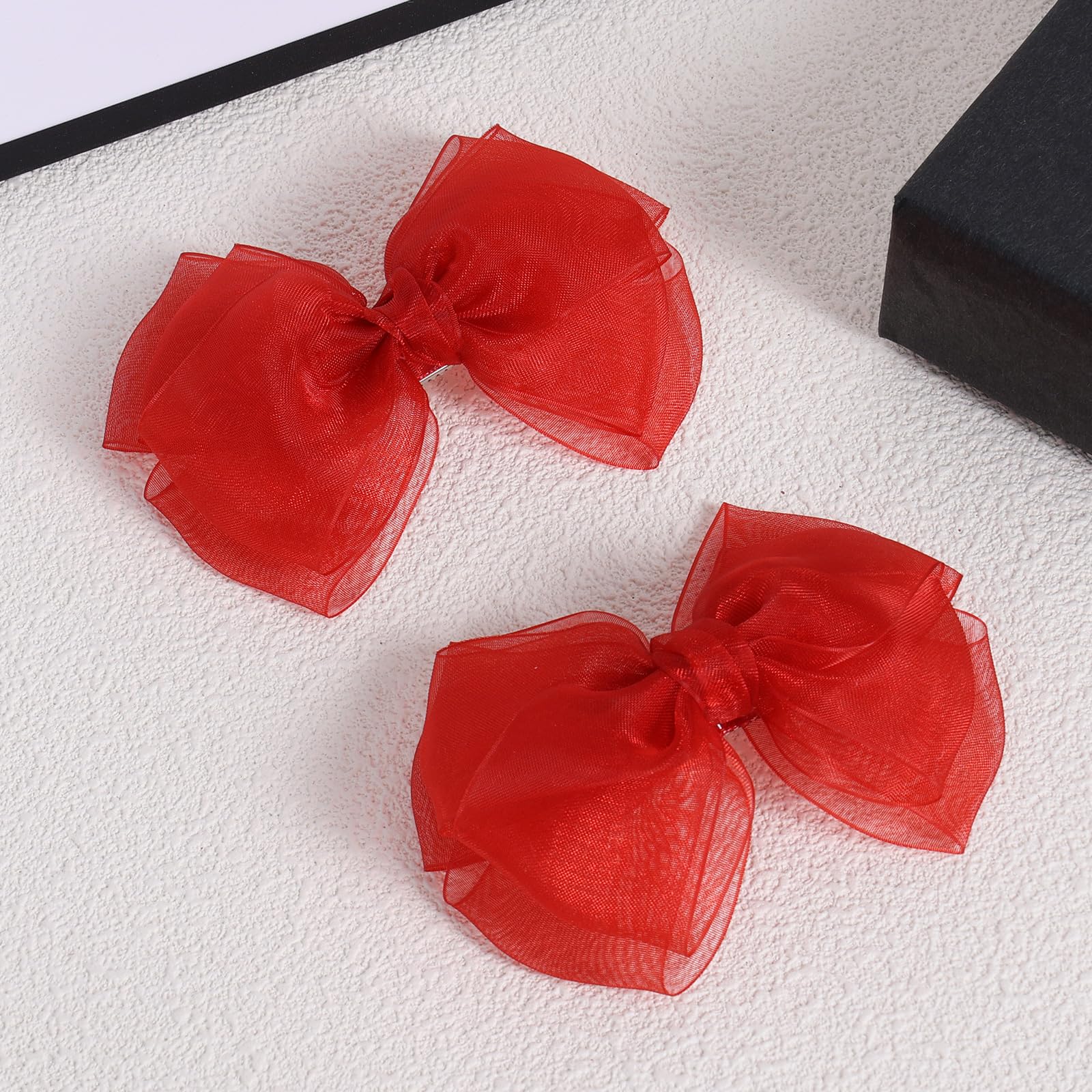 KCHIES red mesh bow clip—side view highlighting secure alligator clip.