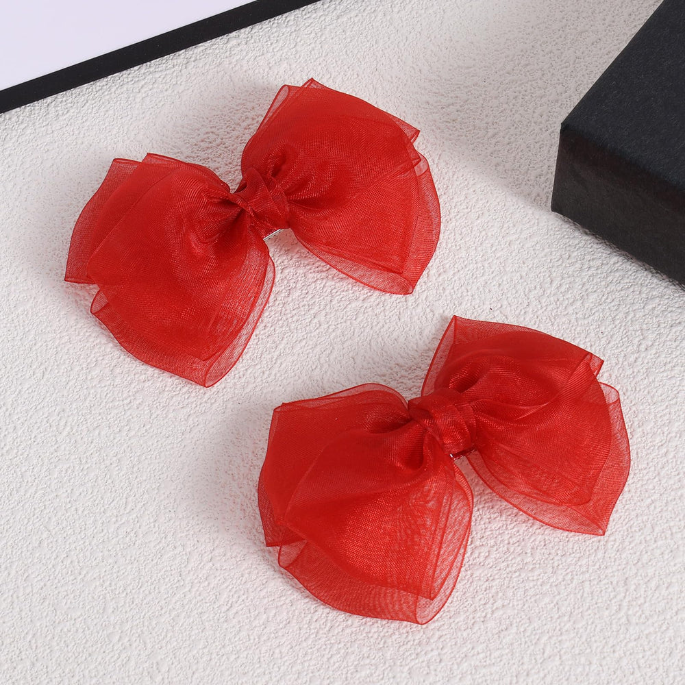 KCHIES red mesh bow clip—side view highlighting secure alligator clip.