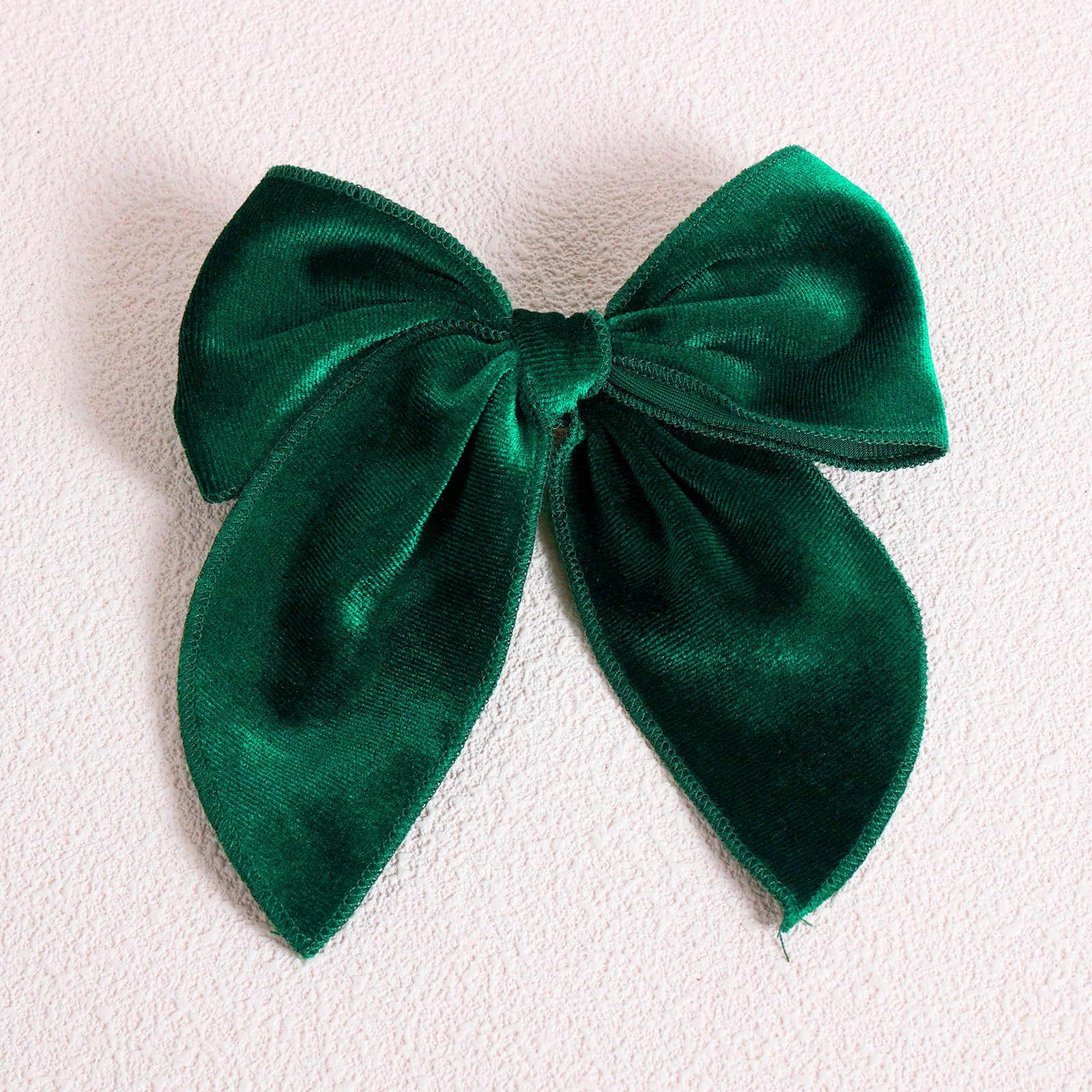 KCHIES 5-inch velvet bow hair clip shows strong grip for all hair types.