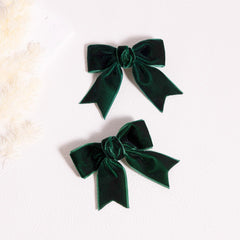 KCHIES velvet bow clip close-up highlighting soft fabric and color