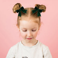 KCHIES dark green velvet bow on sturdy lined clip for toddler styling