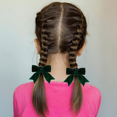 KCHIES velvet bow clip paired with outfits for Christmas and parties