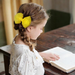 KCHIES Ponytail/Bun Styling with mesh bow adds elegant focal point.