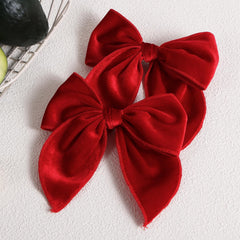 KCHIES red sailor bow clip adds bold style with reliable hair grip.