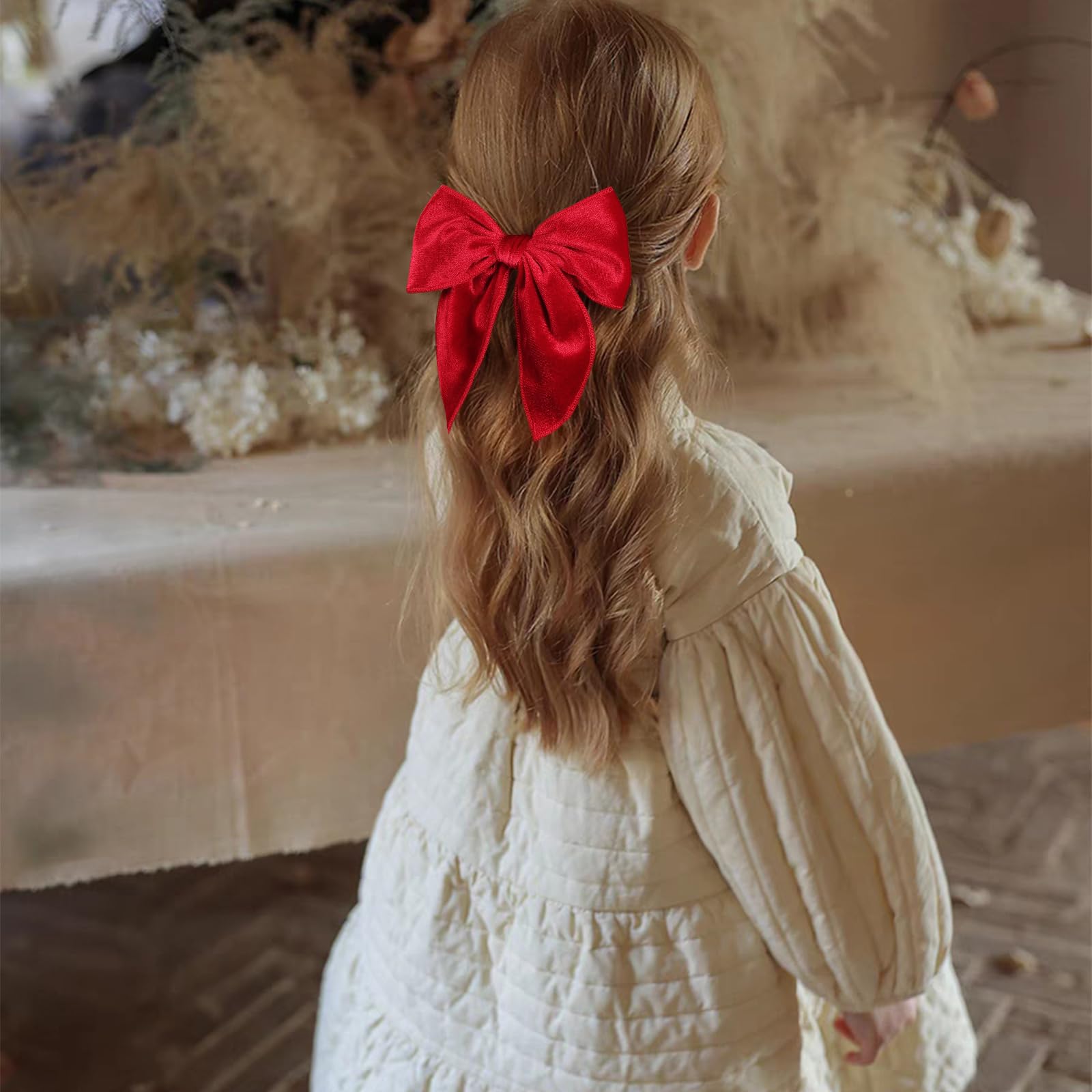 KCHIES red velvet bow closeup shows plush texture and premium finish.