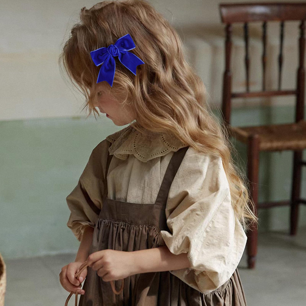 KCHIES royal blue velvet bow clip on hair creates cute side look