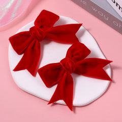 KCHIES velvet ribbon bow closeup showing rich texture for elegant styling