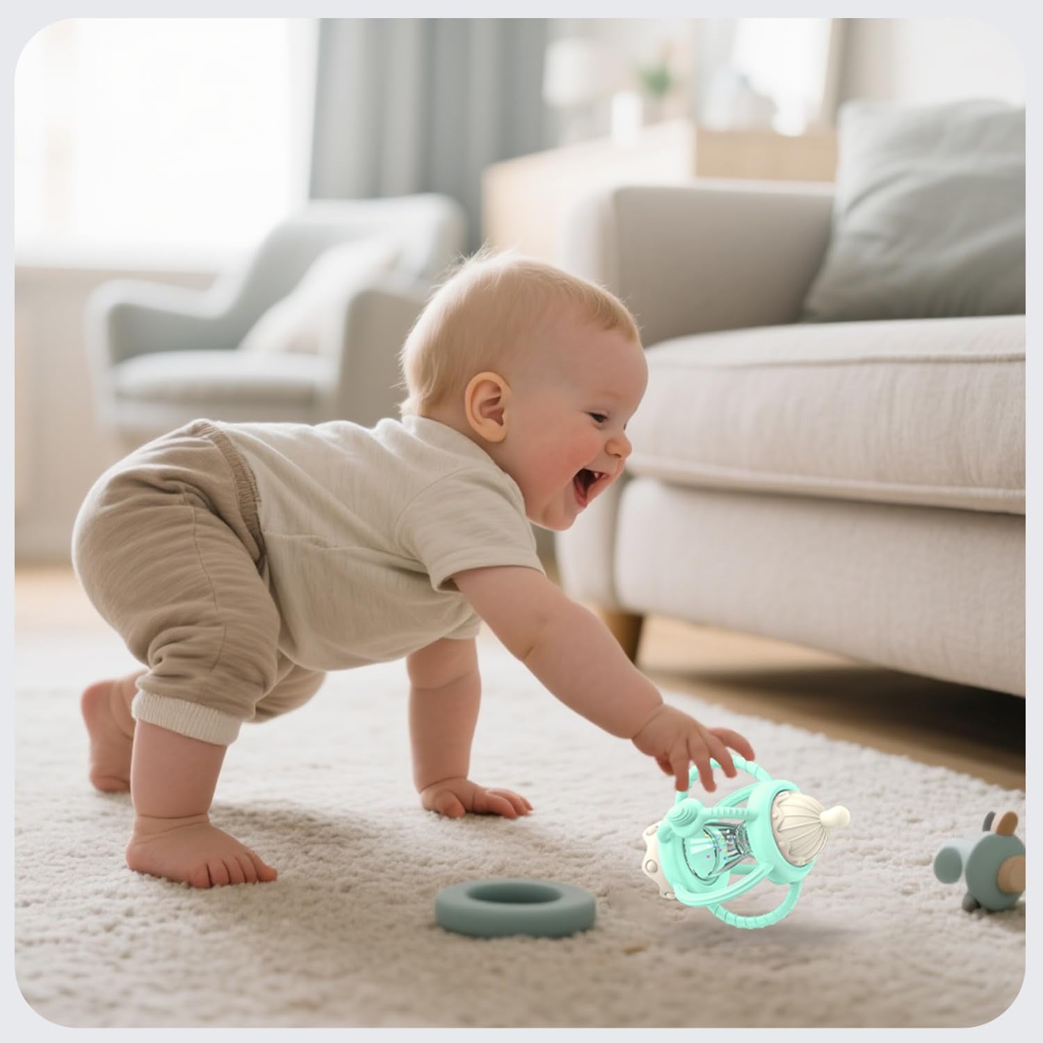 KDTOMOY detachable teether with easy-grip handle for little hands.