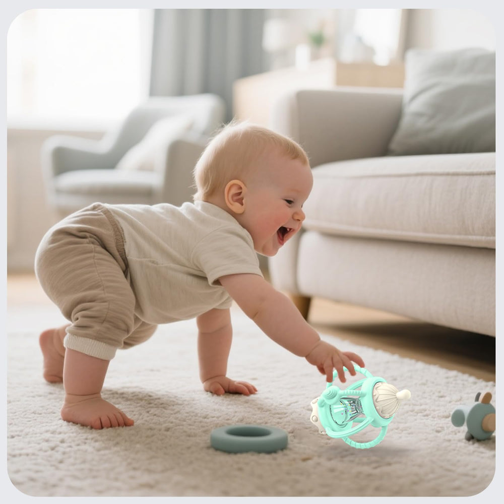 KDTOMOY detachable teether with easy-grip handle for little hands.