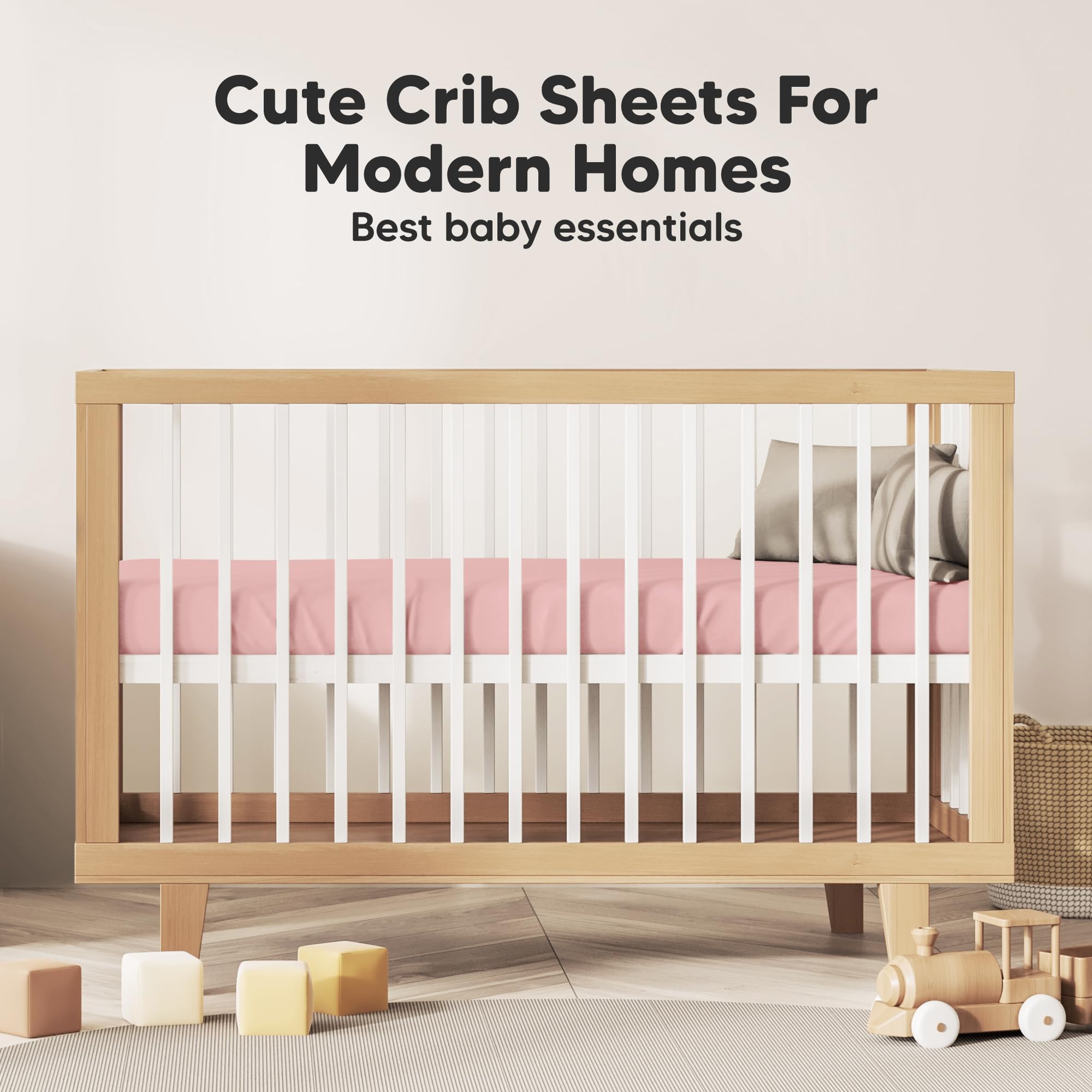 KeaBabies 2-Pack crib sheets rose nursery setup beside crib.